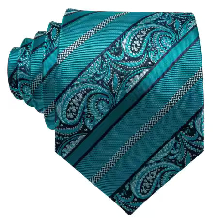 Teal Paisley silk tie shown in rolled or flat view, highlighting fabric texture and pattern on a neutral background.