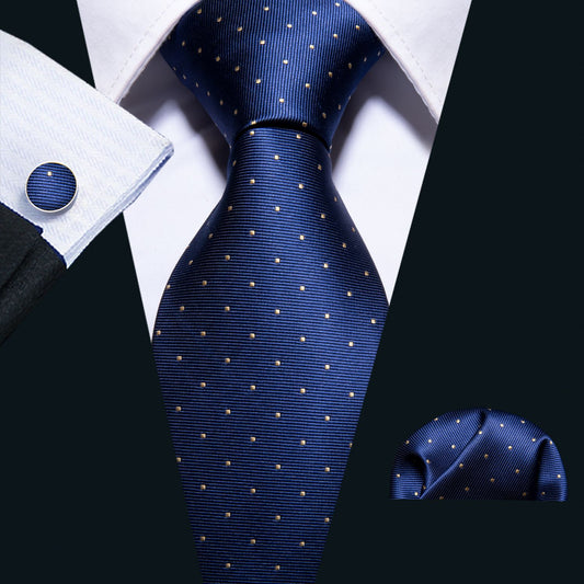 "Premium silk tie set in Regal Blue with Gold Square dots, including a matching pocket square and cufflinks. Sophisticated and versatile for any occasion. Crafted for timeless elegance."