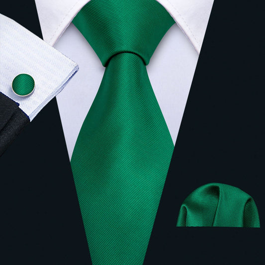 "Premium silk tie set in Solid Green with texture Diagonal Lines, including a matching pocket square and cufflinks. Sophisticated and versatile for any occasion. Crafted for timeless elegance."