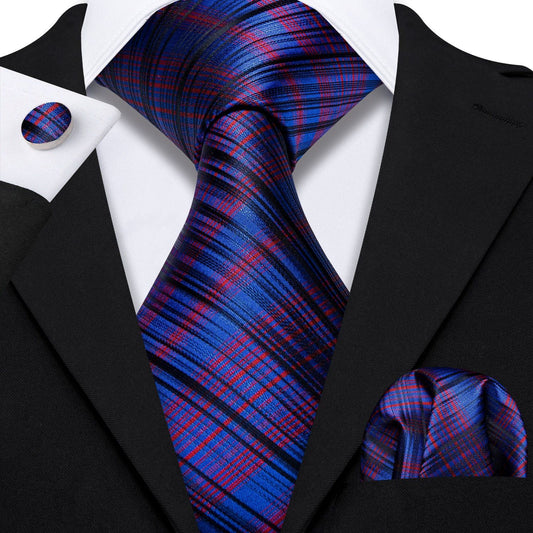 "Premium silk tie set in Royal Blue with Red & Black Diagonal Lines, including a matching pocket square and cufflinks. Sophisticated and versatile for any occasion. Crafted for timeless elegance."