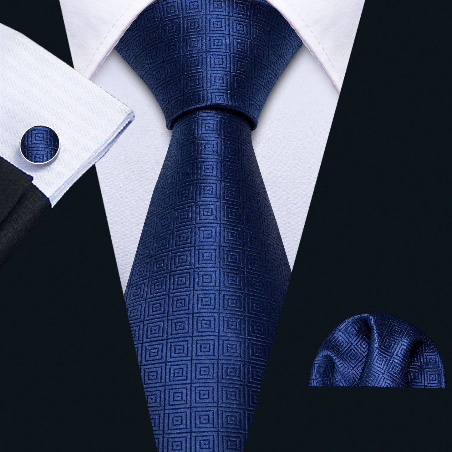 "Premium silk tie set in Blue with Square Patterns, including a matching pocket square and cufflinks. Sophisticated and versatile for any occasion. Crafted for timeless elegance."