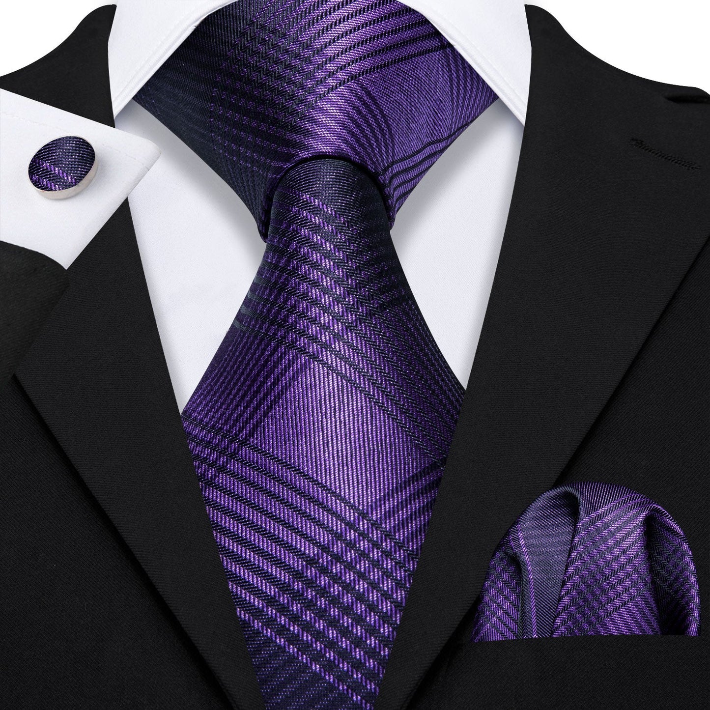 "Premium silk tie set in Dark Purple with Black Diagonal Lines, including a matching pocket square and cufflinks. Sophisticated and versatile for any occasion. Crafted for timeless elegance."