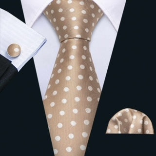 "Premium silk tie set in Tan with cream color Polka-Dots, including a matching pocket square and cufflinks. Sophisticated and versatile for any occasion. Crafted for timeless elegance."