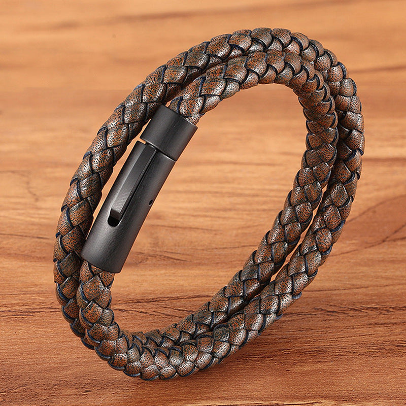 Brown double band braided leather men's bracelet. Stylish and durable metal clasp. Perfect for casual or formal wear.