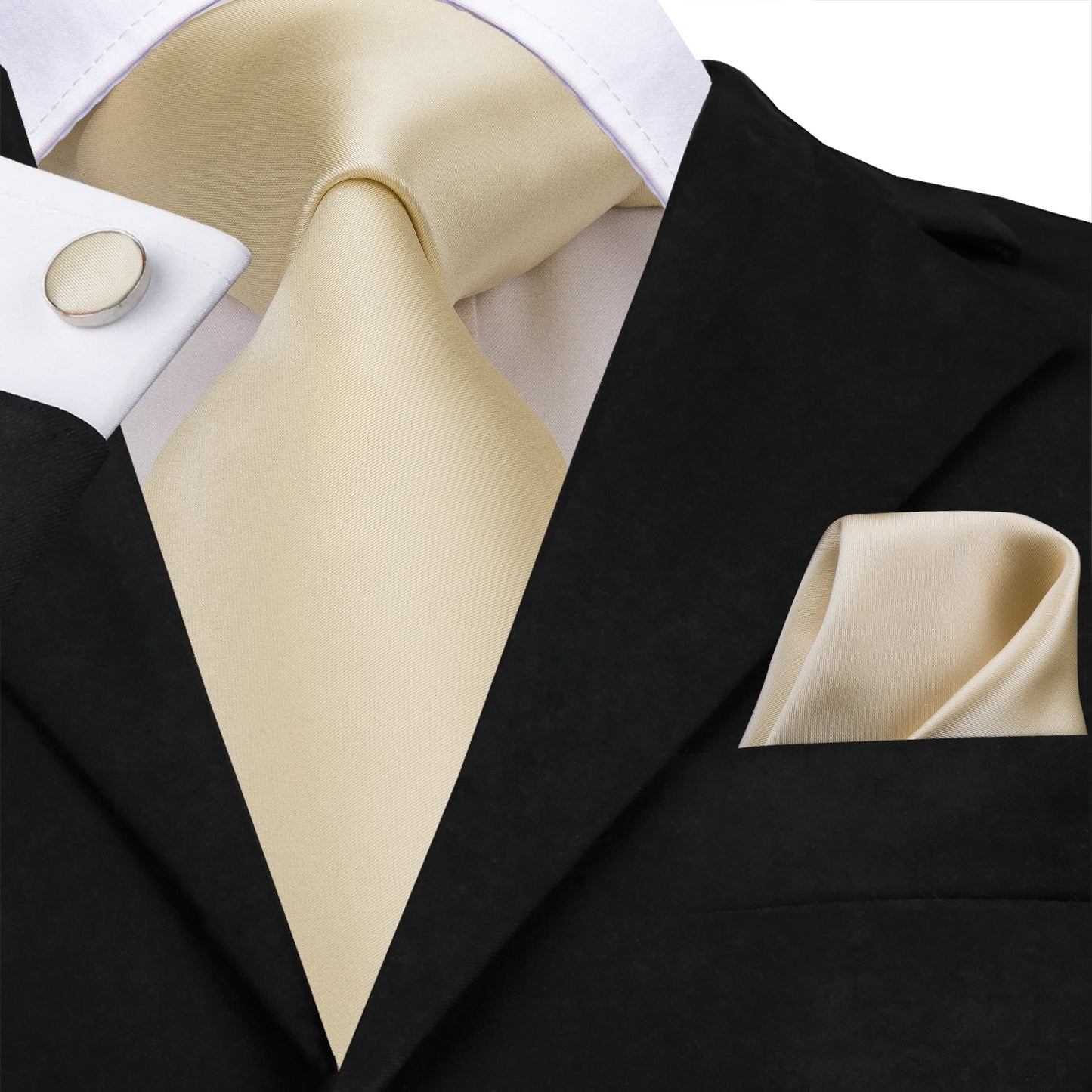 "Premium silk tie set in Solid Cream color with a satin feel, including a matching pocket square and cufflinks. Sophisticated and versatile for any occasion. Crafted for timeless elegance."