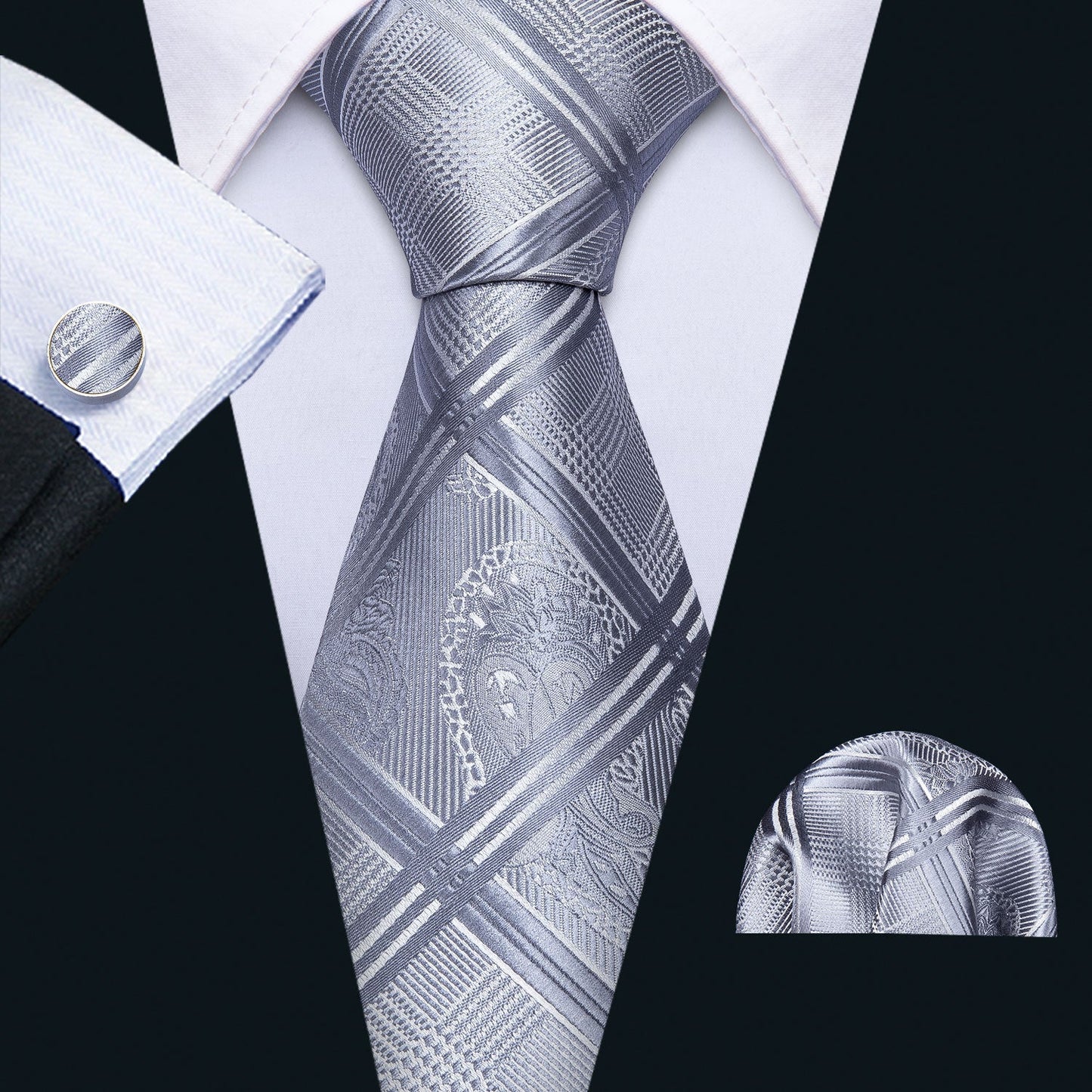 "Premium silk tie set in a Silver Pattern style, including a matching pocket square and cufflinks. Sophisticated and versatile for any occasion. Crafted for timeless elegance."