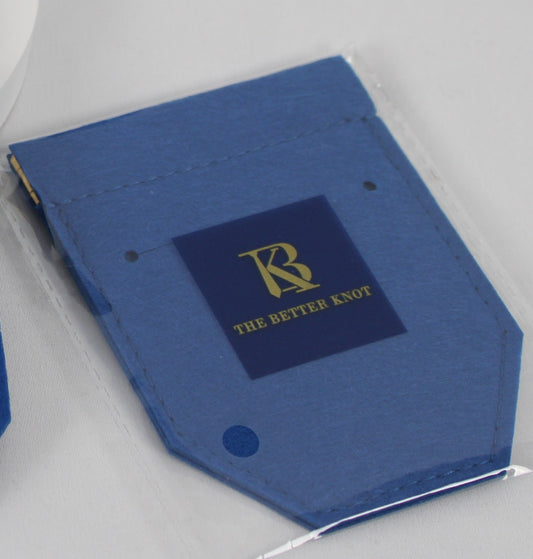 Blue felt pocket square holder with hidden card slot, designed to keep folds in place all day — ideal for weddings, interviews, and formalwear.
