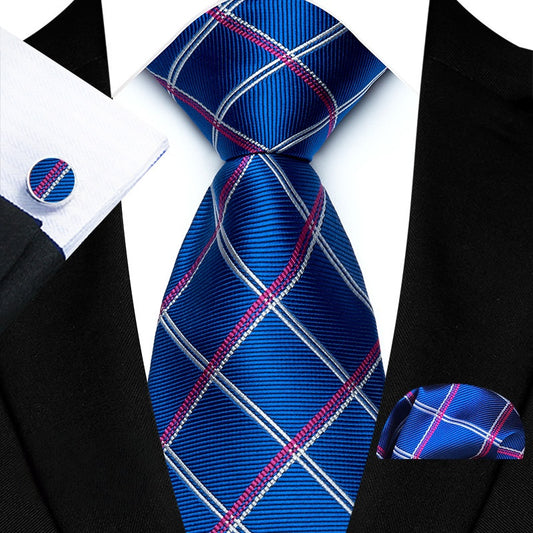 This tie set includes a royal blue silk tie with diagonal purple and white lines, as well as matching cufflinks and pocket square. Crafted from high-quality materials, this set exudes sophistication and style. Perfect for the modern man looking to elevate his formalwear game